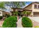 Front yard of a two story home featuring mature trees, desert landscaping and a sidewalk at 5910 W Blue Sky Dr, Phoenix, AZ 85083