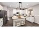 Bright kitchen with an island, stainless steel appliances, and barstool seating at 5910 W Blue Sky Dr, Phoenix, AZ 85083