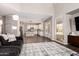 Open-concept living space with views into the kitchen, offering a bright and airy atmosphere at 5910 W Blue Sky Dr, Phoenix, AZ 85083