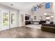 Spacious living room with high ceilings, a large window, and a comfortable seating area at 5910 W Blue Sky Dr, Phoenix, AZ 85083