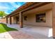 Wide covered patio extends the living space outdoors, features beautiful pavers and outdoor relaxation at 5910 W Blue Sky Dr, Phoenix, AZ 85083