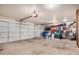 Spacious garage with ample storage, dual garage doors, and overhead lighting at 654 W Fremont Dr, Tempe, AZ 85282