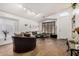 Bright living room featuring wood flooring, high ceilings, and neutral colors at 654 W Fremont Dr, Tempe, AZ 85282