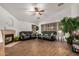 Inviting living room featuring a fireplace and ample seating at 654 W Fremont Dr, Tempe, AZ 85282