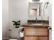 Bathroom with granite vanity, sink, and nearby toilet with tasteful plant at 6622 E Voltaire Ave, Scottsdale, AZ 85254