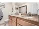 Bathroom featuring double vanity with granite countertop and modern fixtures at 6622 E Voltaire Ave, Scottsdale, AZ 85254