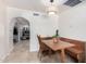 Kitchen nook with custom bench seating and an arched entry, providing an intimate dining space at 6622 E Voltaire Ave, Scottsdale, AZ 85254