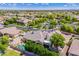 Aerial view showcases this single-Gathering home in a well-maintained neighborhood with mature landscaping at 7018 E Ingram St, Mesa, AZ 85207