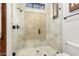 Bathroom showing enclosed shower with decorative mosaic tile and glass door at 7018 E Ingram St, Mesa, AZ 85207