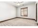 Bedroom featuring neutral carpet, natural light, and a ceiling fan at 7018 E Ingram St, Mesa, AZ 85207