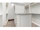 Well-organized walk-in closet with custom shelves and drawers at 7018 E Ingram St, Mesa, AZ 85207