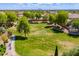 This community features a large grassy recreation area with mature trees and a soccer goal at 7018 E Ingram St, Mesa, AZ 85207