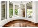 Dining area features large windows overlooking the pool and backyard at 7018 E Ingram St, Mesa, AZ 85207