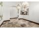 Bright dining area with archway details and modern hanging light fixtures at 7018 E Ingram St, Mesa, AZ 85207