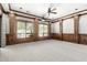 Beautiful Home Theater features wood trim, shutters, and a projector at 7018 E Ingram St, Mesa, AZ 85207