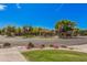 Community playground featuring mature shade trees, colorful structures, and shade canopies at 7018 E Ingram St, Mesa, AZ 85207