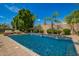 Beautiful pool with manicured landscaping at 7018 E Ingram St, Mesa, AZ 85207