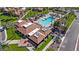 Aerial shot of the community showcasing the pool, clubhouse, and well-maintained landscaping at 7405 N Via Camello Del Norte -- # 137, Scottsdale, AZ 85258