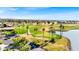 Expansive golf course view from the air with palm trees and a pond enhancing the serene setting at 7405 N Via Camello Del Norte -- # 137, Scottsdale, AZ 85258