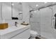 Modern bathroom with sleek white vanity, marble-look tiled shower, and contemporary fixtures at 7405 N Via Camello Del Norte -- # 137, Scottsdale, AZ 85258