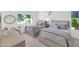 Bright bedroom with two beds, large windows, and serene views of the outdoor landscape at 7405 N Via Camello Del Norte -- # 137, Scottsdale, AZ 85258