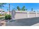 Convenient garage parking with multiple units, surrounded by desert landscaping and palm trees at 7405 N Via Camello Del Norte -- # 137, Scottsdale, AZ 85258