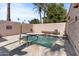 Inviting hot tub area with seating, landscaping, and a relaxing ambiance for residents at 7405 N Via Camello Del Norte -- # 137, Scottsdale, AZ 85258