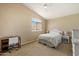 Bright bedroom with a vaulted ceiling and neutral walls, featuring a cozy work station at 7438 E Glenn Moore Rd, Scottsdale, AZ 85255