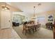 Open living space featuring a dining area, living room, and plenty of natural light at 7438 E Glenn Moore Rd, Scottsdale, AZ 85255