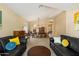 Spacious living space that is open to the dining area, and features modern neutral decor at 7438 E Glenn Moore Rd, Scottsdale, AZ 85255
