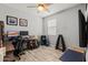 Bedroom space with desk, guitars, monitors, and weights at 7732 S 23Rd St, Phoenix, AZ 85042