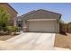 Charming single-story home with a two-car garage and well-maintained landscaping at 7732 S 23Rd St, Phoenix, AZ 85042