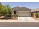 Charming single-story home with a two-car garage and a well-maintained, low maintenance landscaped front yard at 7732 S 23Rd St, Phoenix, AZ 85042