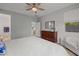 Spacious main bedroom with neutral walls, and en-suite bathroom at 7732 S 23Rd St, Phoenix, AZ 85042