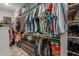 Spacious walk-in closet with extensive hanging space, shelving, and dresser storage at 7732 S 23Rd St, Phoenix, AZ 85042