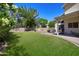 Wide open backyard with covered patio, desert landscaping and plenty of room to entertain at 8228 S Stephanie Ln, Tempe, AZ 85284