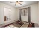 Bedroom with curtains, carpet, view to the bathroom, and standard closet provides comfortable living at 8255 E Kiva Ave # 420, Mesa, AZ 85209