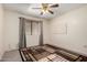 Bright bedroom featuring neutral carpet, blinds, and curtains to create a calm and inviting living space at 8255 E Kiva Ave # 420, Mesa, AZ 85209