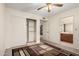 Bedroom with standard closet with easy access to the connected bathroom with vanity and shower at 8255 E Kiva Ave # 420, Mesa, AZ 85209