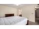 Bright bedroom with a large bed, dresser, ceiling fan, and ensuite bathroom access at 8255 E Kiva Ave # 420, Mesa, AZ 85209