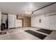 Well-organized garage featuring storage cabinets and ample space for parking and storage at 8255 E Kiva Ave # 420, Mesa, AZ 85209