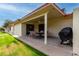 Private covered patio with outdoor dining area, seamlessly blending indoor and outdoor living spaces at 8255 E Kiva Ave # 420, Mesa, AZ 85209