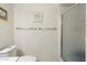 Clean and functional bathroom featuring a toilet and a glass-enclosed shower at 8255 E Kiva Ave # 422, Mesa, AZ 85209