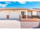 Charming single-story home featuring a well-manicured lawn, two-car garage, and inviting entryway at 8255 E Kiva Ave # 422, Mesa, AZ 85209