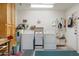 Functional laundry area with washer, dryer, sink, storage cabinets, and space for household tasks and cleaning at 8255 E Kiva Ave # 422, Mesa, AZ 85209
