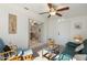 Inviting living room featuring a ceiling fan and a cozy seating area with a view into a separate living area at 8255 E Kiva Ave # 422, Mesa, AZ 85209