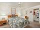 Spacious bedroom with a plush bed, ensuite bathroom, and walk-in closet providing ample storage at 8255 E Kiva Ave # 422, Mesa, AZ 85209