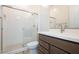 Modern bathroom featuring a glass enclosed shower, vanity with stylish fixtures and grey cabinets at 852 W Golden Ore Pass, Apache Junction, AZ 85120