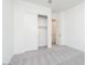 This bedroom features a closet, neutral carpet and white walls at 852 W Golden Ore Pass, Apache Junction, AZ 85120