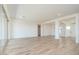 Bright living room with neutral walls, recessed lighting, and wood-look tile flooring at 852 W Golden Ore Pass, Apache Junction, AZ 85120